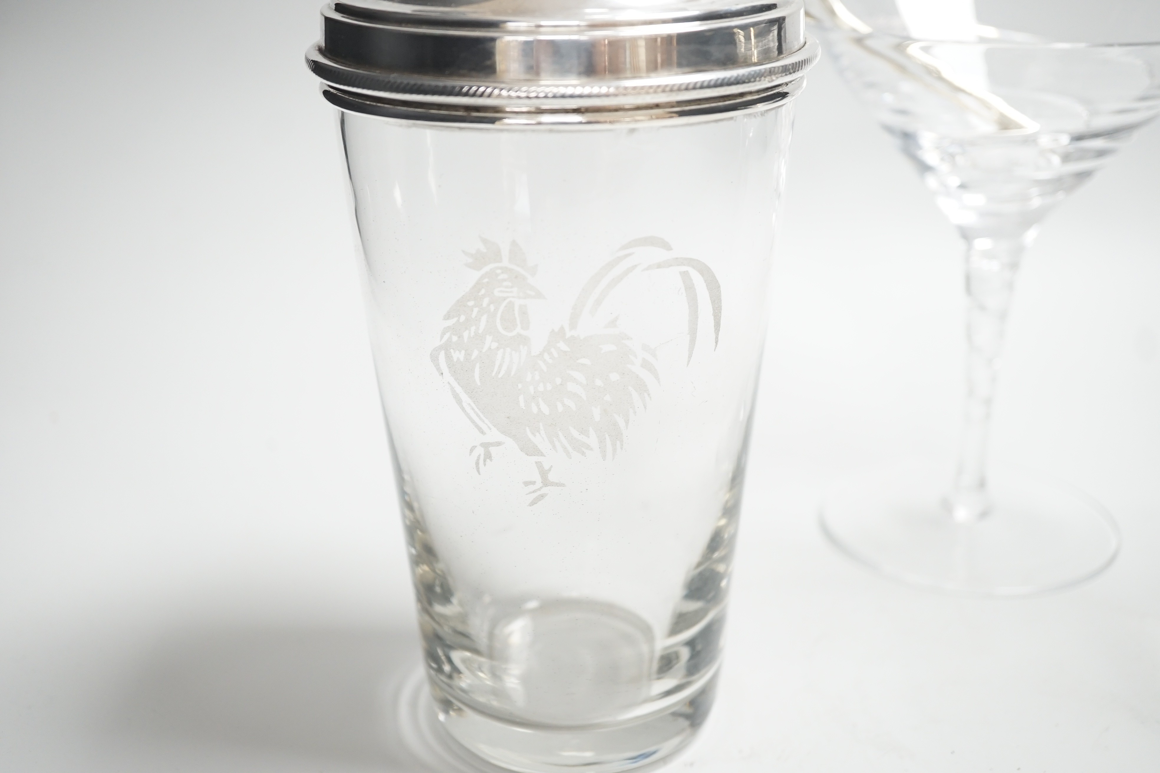 A silver plated cockerel cocktail shaker together with silver stirrers and glasses